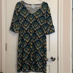 Beautiful dress. Perfect for the office, a shower
